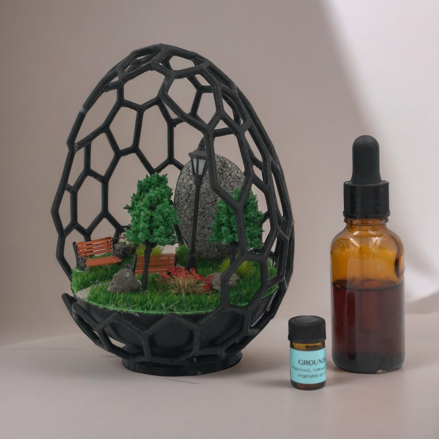 Miniature Park Diorama in Geometric Egg – A Tranquil Nature Scene